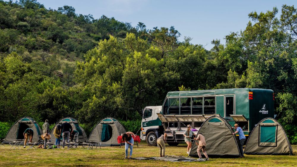drifters camping tours/camping tour set up next to vehicle